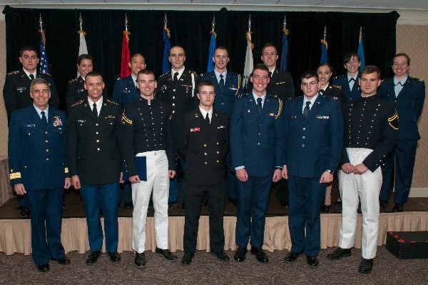 Adm. Abel (front row, l) joins 15 of the chapter's 21 ROTC scholarship recipients honored in April.